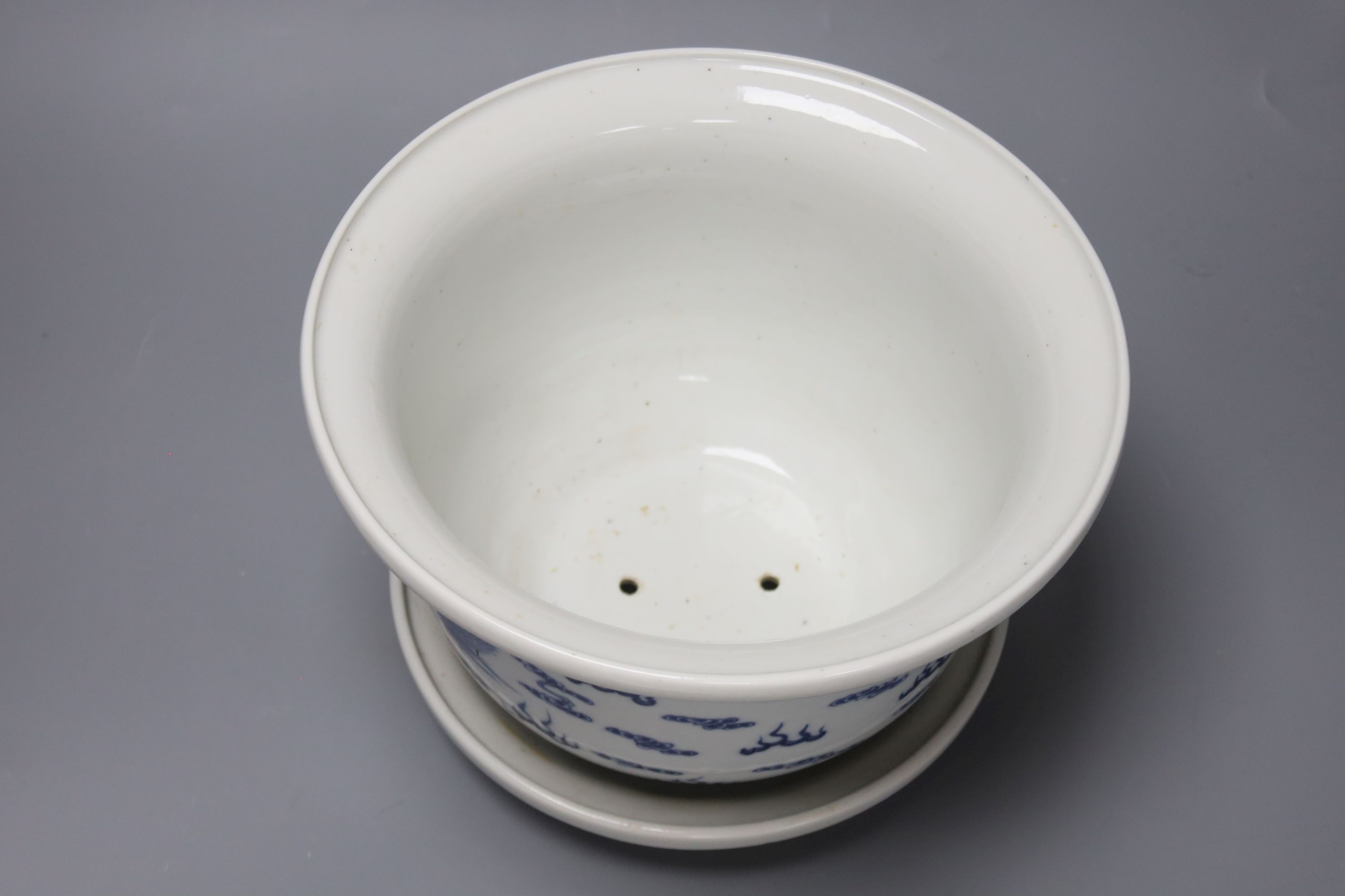 A 19th century Chinese porcelain jardiniere on stand